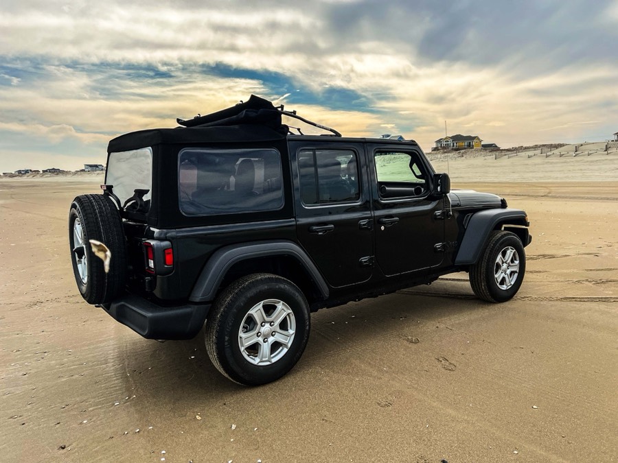 Jeep Wrangler at golden hour on the 4x4 beach, Outer Banks